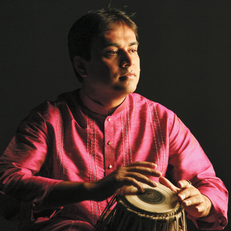 Sandeep Das performs a Northern Indian music program for schools